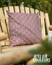 Coussin rose et fleurs blanches/rouges 60x60cm
